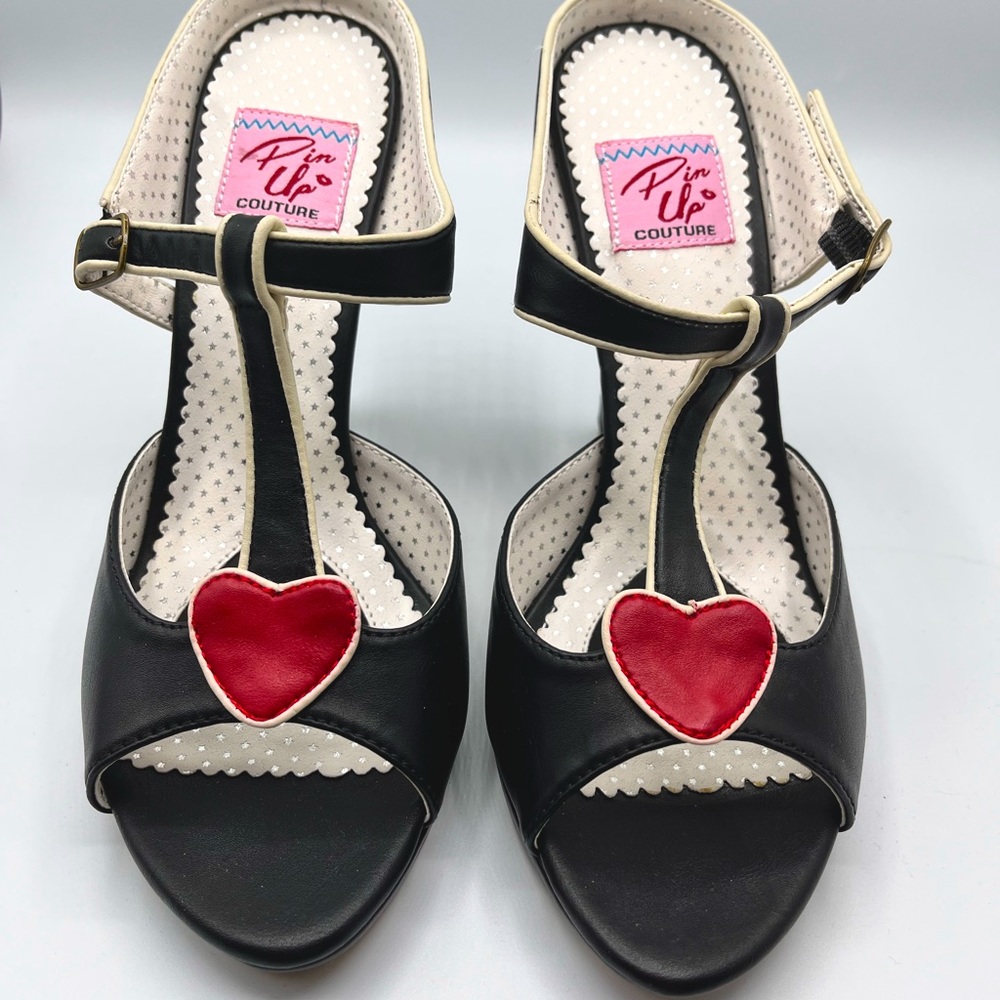 Black pin up couture heels with hearts
